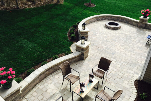 Aerial view of paver patio with seat walls