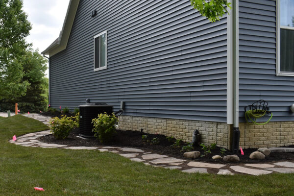 Mulched landscape bed with plantings