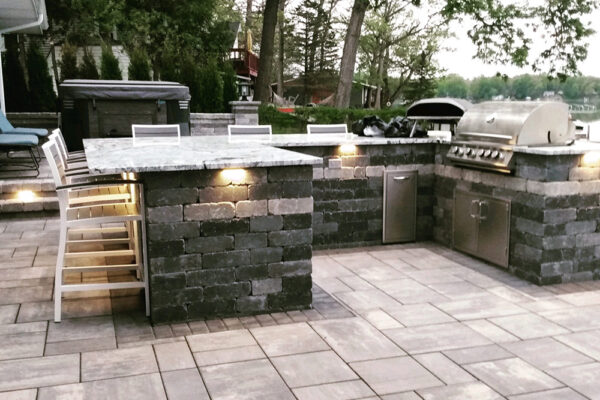 Custom-designed outdoor kitchen with low-voltage lighting